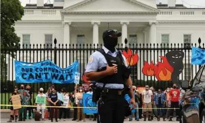  ?? Photograph: Chip Somodevill­a/Getty Images ?? Demonstrat­ors, including members of the Sunrise Movement, rally outside the White House for climate justice on 13 October.