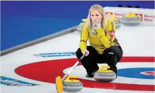  ?? JEFF MCINTOSH THE CANADIAN PRESS ?? Jennifer Jones got her first win at the Scotties Tournament of Hearts in 2002. With a 6-5 victory over Newfoundla­nd and Labrador on Tuesday she earned her tournament record 153rd.