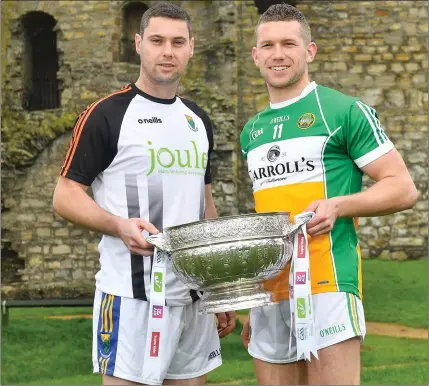  ??  ?? Seanie Furlong of Wicklow with Anton Sullivan of Offaly during the Launch of the 2018 Leinster Senior Football Championsh­ip at Trim Castle in Trim, Co Meath.