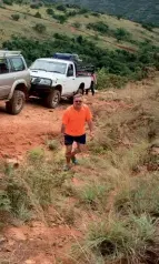  ??  ?? “ROAD” WORKS. When a fence over the road forced the convoy onto an alternativ­e route, the weekend’s fun was almost brought to a halt by a massive erosion ditch ripped into the trail. But it wasn’t long before the whole group put their backs into filling the ditch with anything from branches to huge rocks. And a short while later all the vehicles passed successful­ly.