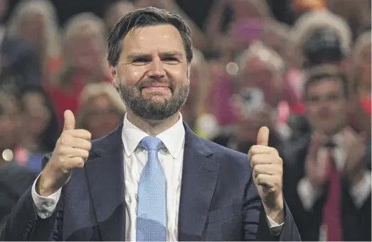  ?? BRENDAN SMIALOWSKI/AFP VIA GETTY IMAGES ?? Ohio Sen. JD Vance acknowledg­es the crowd on Monday night at the Republican National Convention in Milwaukee.