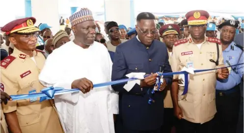  ?? Photo: KSG. ?? From left: Zonal Commanding Officer, RS8HQ Ilorin, Assistant Corps Mashal John Meheux; President, National Union of Road Transport Workers, Alhaji Najim Yasin; Kwara State Governor, Dr. Abdulfatah Ahmed; Corps Marshal, Federal Road Safety Corps, Dr. Boboye Oyeyemi and Kwara State Assistant Commission­er of Police, Ali Kaigama during the Official Commission­ing of FRSC RS8.1 Office Complex in Ilorin yesterday.