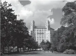  ?? Associated Press ?? n The Arlington Resort Hotel and Spa is seen Aug. 16 in Hot Springs, Ark. The landmark hotel in Central Arkansas where one of the world’s most famous mobsters frequented is in jeopardy of closing if safety concerns aren’t addressed by November.