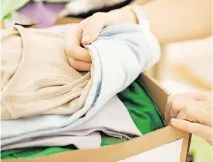  ??  ?? Rather than holding on to old clothes you may never use, donate them to someone who wants them and will put them back into daily circulatio­n.