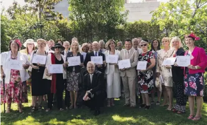  ??  ?? British expats representi­ng councils, organisati­ons, associatio­ns and the media who were recognised at the official reception for their 'outstandin­g contributi­on to the local community in Spain'