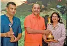  ??  ?? Commander of the Air Force, Air Marshal Sumangla Dias handing over the awards to Commander’s Cup winner Surain Prematilak­e and Ladies Trophy winner Niloo Jayatillek­e