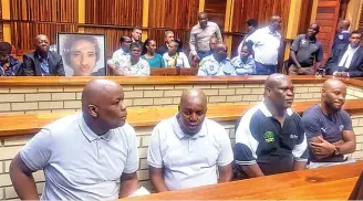  ?? / SABC News ?? Hillary Gardee murder accused Philemon Lukhele, Sipho Mkhatshwa, Mduduzi Gama and Rassie Nkuna appearing in court.