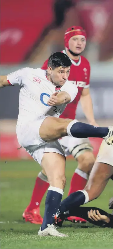  ??  ?? England's Ben Youngs kicks the ball clear during the Autumn Nations Cup match at Parc y Scarlets.