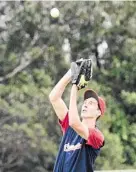  ?? PHOTO: NEV MADSEN ?? IN PLACE: Rangers’ Brenton Althaus takes a catch against Redcliffe.