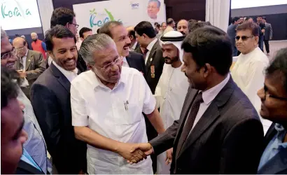  ?? Photo by Shihab ?? Pinarayi Vijayan greets the audience after his address at Together with Kerala event in Dubai on Friday. —