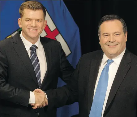  ?? DAVID BLOOM / POSTMEDIA NEWS ?? Conservati­ves in Alberta have to decide whether to unite behind Brian Jean, left, or Jason Kenney.
