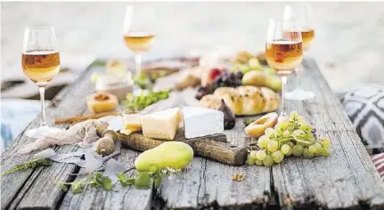  ??  ?? Orange wines pair well with strong cheeses, charcuteri­e and olives.