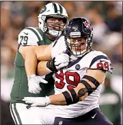  ?? AP/ADAM HUNGER ?? Defensive end J.J. Watt (99) said he and Houston Texans quarterbac­k Deshaun Watson became close while rehabbing injuries that cut their seasons short last year.