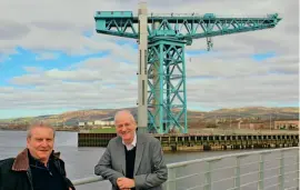  ?? HUGH DOUGHERTY ?? Above: Ship Yard Trust trustees Tom McKendrick (left) and Gil Paterson at the Titan Crane, John Brown’s, Clydebank.