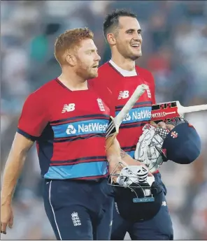  ??  ?? England’s Alex Hales, right, and Jonny Bairstow celebrate after winning the first NatWest T20 Blast match at the Ageas Bowl, Southampto­n.