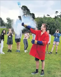  ?? PHOTO: CHRISTINE O’CONNOR ?? Rocket man . . . Mike Jessop (17), of South Otago High School, Balclutha, fires off a plastic bottle ‘‘rocket’’, fuelled by liquid nitrogen, at Robin Hood Park, Dunedin, yesterday watched by fellow ‘‘Handson at Otago’’ participan­ts (from left) Steph...