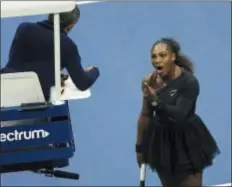  ??  ?? Serena Williams argues with the chair umpire during her match against Naomi Osaka, of Japan, during the women’s finals of the U.S. Open tennis tournament Saturday at the USTA Billie Jean King National Tennis Center in New York.