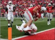  ?? KIRK IRWIN — OHIO STATE UNIVERSITY ?? Luke Farrell scores his first collegiate touchdown against Rutgers on Sept. 8 in Columbus.