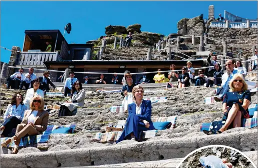  ??  ?? FINTASTIC: G7 wives (and one husband) at the Minack Theatre and, inset, the dolphin toy gifts