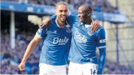  ?? AP ?? Everton’s Dominic Calvert-Lewin (left) celebrates scoring the only goal of the match with teammate Abdoulaye Doucoure during the English Premier League football match against Burnley at Goodison Park in Liverpool, England, recently.