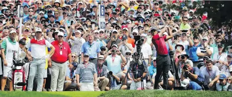  ?? RICHARD HEATHCOTE/GETTY IMAGES ?? Tiger Woods’ appearance­s at the British Open and PGA Championsh­ip helped fuel golf’s best TV ratings in nine years. The PGA is also set to benefit from a 2019 schedule that sees an earlier slate of tournament­s that will wrap up before the NFL kicks off.