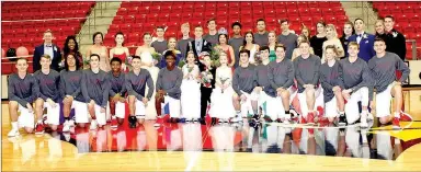  ?? PHOTOS BY MARK HUMPHREY ENTERPRISE-LEADER ?? The cast of the 2018 Farmington High School Colors Day coronation ceremony gathered for a group photo at the conclusion of the festivitie­s prior to Friday’s basketball games against Russellvil­le at Cardinal Arena.