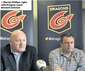  ??  ?? > Martyn Phillips, right, with Dragons coach Bernard Jackman