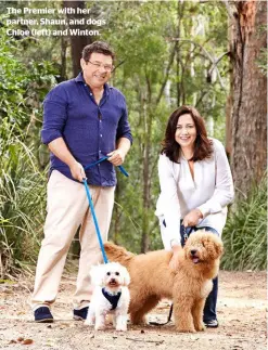  ??  ?? The Premier with her partner, Shaun, and dogs Chloe (left) and Winton.