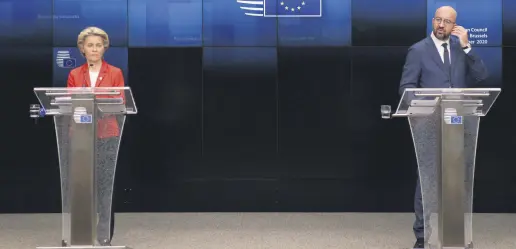  ??  ?? European Council President Charles Michel (R), and European Commission President Ursula von der Leyen participat­e in a press conference at an EU summit at the European Council building in Brussels, Oct. 2, 2020.
AP