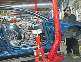  ??  ?? NEW POSITIONS are coming to the Fremont, Calif., and Reno, Nev., factories to fulfill production goals, according to an email from Tesla’s automotive president.