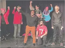  ?? PHOTO SUBMITTED ?? Members of the chorus sing “We are the Resistance” during a workshop performanc­e Friday, Jan. 10, at Donald Oat Theater in Norwich of the rock opera “You’re Fired!” by John Waller.