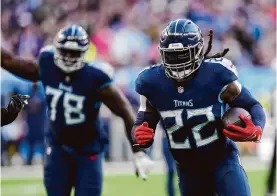  ?? Steve Luciano/associated Press ?? Running back Derrick Henry heads to the Ravens after eight seasons with the Titans, including four Pro Bowl selections and two NFL rushing titles.