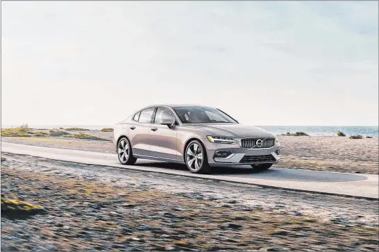  ?? Volvo ?? An electric motor and gas engine work in harmony for the ultimate plug-in hybrid sedan for less tailpipe emissions, more traction and instant power.