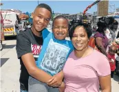  ?? Picture: WERNER HILLS ?? FAMILY FUN: Tyrique, 14, left, Jaden, 7, and Nawhaal Blaauw were at the Transnet National Ports Authority People’s Port Festival at the PE harbour at the weekend