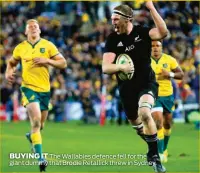  ??  ?? BUYING IT The Wallabies defence fell for the giant dummy that Brodie Retallick threw in Sydney.