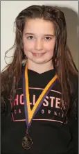  ??  ?? Ciara Bethall of Adamstown, Under-14 breaststro­ke winner.