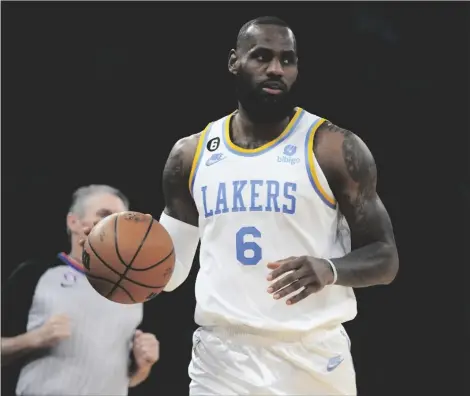  ?? AP PHOTO/FRANK FRANKLIN II ?? Los Angeles Lakers’ LeBron James (6) looks to pass during the second half of an NBA basketball game against the New York Knicks on Tuesday in New York. The Lakers won 129-123 in overtime.