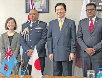  ?? Photo: Sheenam Chandra. ?? From left, a Japanese Embassy official, Commission­er of Police Brigadier General Sitiveni Qiliho, Japanese Ambassador Masahiro Omura and Permanent Secretary in the Office of Prime Minister Yogesh Karan at the Exchange of Notes Signing Ceremony funded by the Japan Government to the Fijian Government at the Office of the Prime Minister on December 18, 2018,