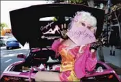  ?? Tara Ziemba Getty Images ?? ANGELYNE AT the 2017 pride parade. “If I win,” she said, “I promise that I will not sit in an office.”