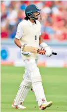  ??  ?? Long walk back: Haseeb Hameed leaves the field having been bowled first ball