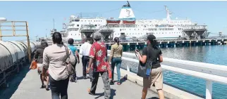  ?? FILE ?? Persons have been visiting the ‘Logos Hope’, which has been docked at the Carib Cement pier in Rockfort, Kingston, since it arrived here earlier this month. The strike at the cement company has prevented them from going there.