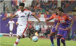  ??  ?? Bengaluru FC’s Miku in action against FC Pune City in their ISL- 4 match in Pune on Thursday. Bengaluru won 3- 1.