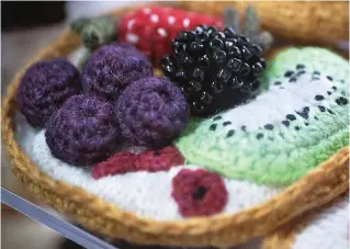  ??  ?? A work of tart: Fruit concoction with kiwi, grapes and mixed berries