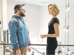  ?? BILD: Philippe Bosse/Lionsgate/Everett Collection via Imago ?? Ein unterschie­dliches Paar: Seth Rogen und Charlize Theron in „Long Shot“