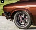  ??  ?? 2: James Brown rides on Santhuff struts up front with PMJ coil springs, while Menscer two-way shocks live out back with a PMJ four-link rear end. Braking is handled by Strange Engineerin­g discs all ’round, with a Wilwood master cylinder holding pressure