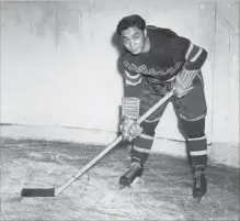  ?? NEW YORK TIMES ?? Larry Kwong, a five-foot-six centre known as the China Clipper for his speed, played in Quebec and Europe after his stint with the Rangers.