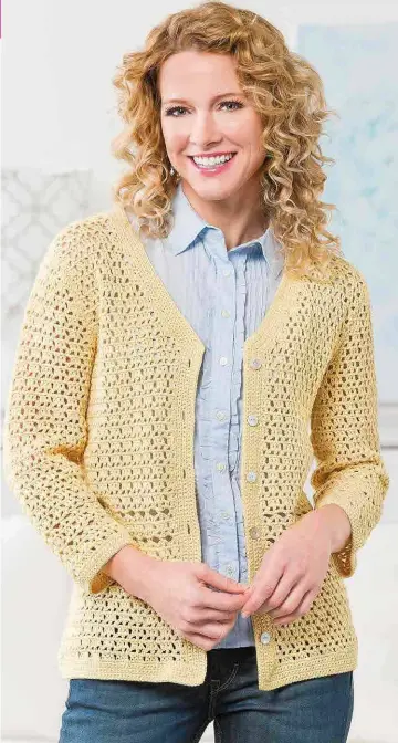  ??  ?? Timeless, classic styling and a touch of color make this cardi the perfect summer sweater. Simple, basic stitches create the open lacy look, perfect for casual or dressy wear.