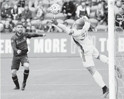  ?? HARRY HOW/GETTY IMAGES ?? Diego Rossi of Los Angeles FC reacts as Luis Robles of Inter Miami CF makes a a save on his header during the first half.