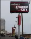  ?? WAYNE PARRY - THE ASSOCIATED PRESS ?? An electronic sign welcomes visitors to the Atlantic City, N.J., Boardwalk on Thursday.
