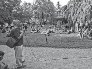  ?? TIM KROCHAK • THE CHRONICLE HERALD ?? Isaac Saney, a Dalhousie University professor, gives his presentati­on about the Boer War statue in the Public Gardens during the Walk Against Winston, a guided tour of downtown Halifax's monuments to slavery and colonialis­m held last month.